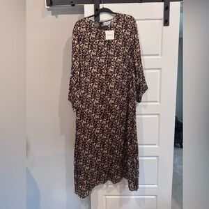 Elegant Black and Cream Patterned Long Sleeve Dress